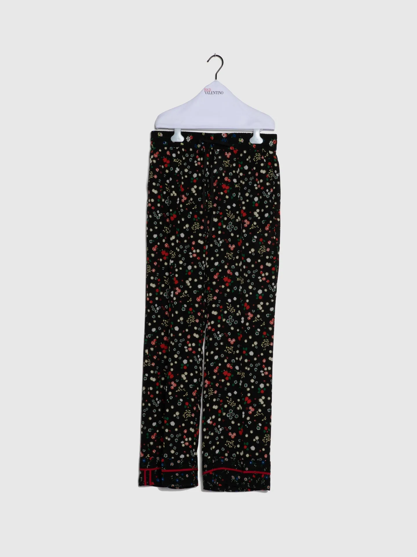 Calças com Flores em Preto