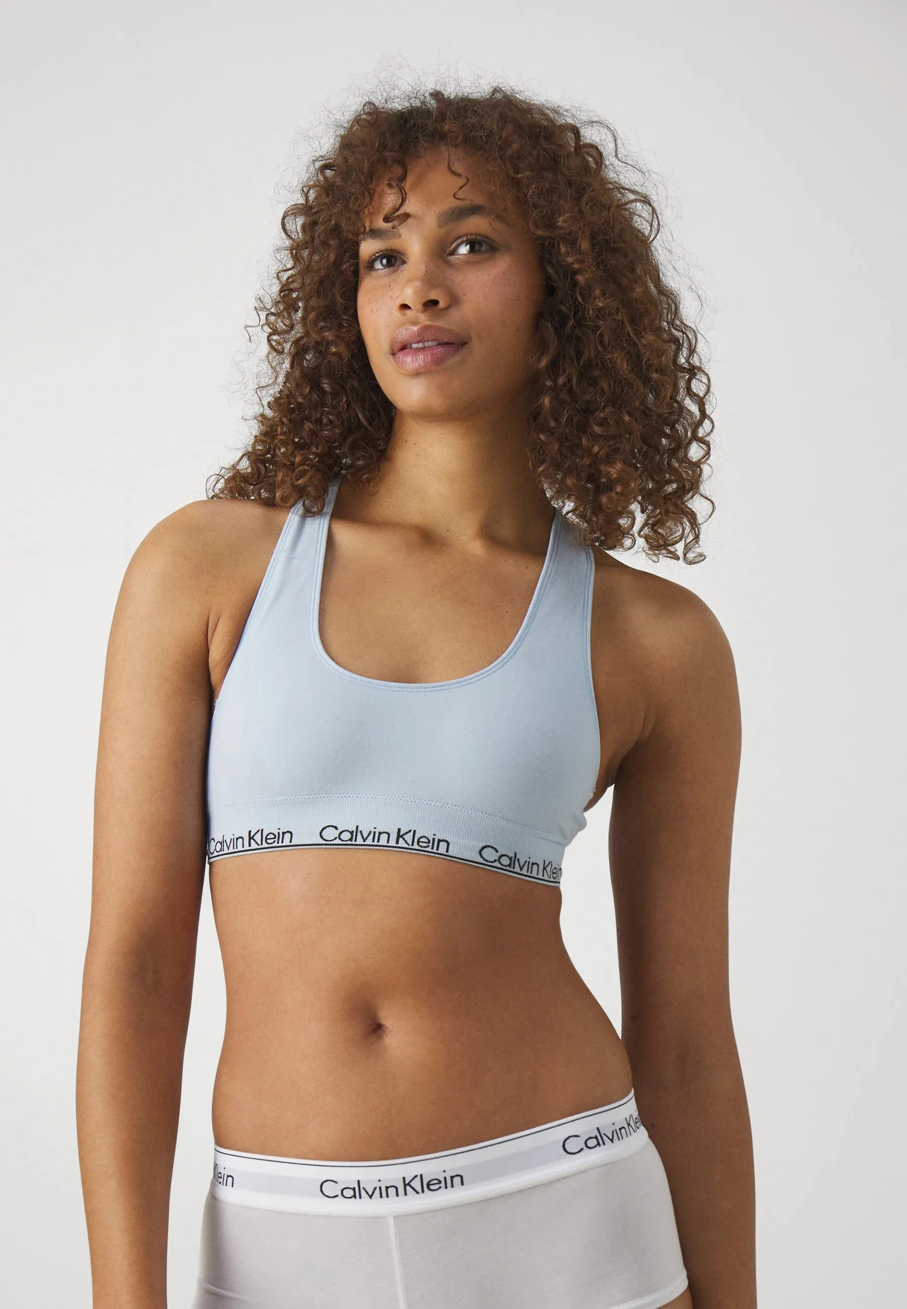 Calvin Klein MODERN SEAMLESS Womens Racerback Bralette Skyway Blue